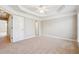 Spacious bedroom with tray ceiling, carpeted flooring and a large window providing lots of light at 4899 Seldon Se Way, Smyrna, GA 30080