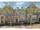 Inviting townhome exterior with lush greenery and well-maintained facade, creating a welcoming curb appeal at 4899 Seldon Se Way, Smyrna, GA 30080