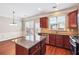 Open kitchen and dining area with stainless steel appliances and granite countertops at 4899 Seldon Se Way, Smyrna, GA 30080
