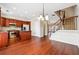 Stylish open-concept kitchen with an island, stainless steel appliances, and seamless flow to the living space at 4899 Seldon Se Way, Smyrna, GA 30080