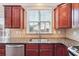 The kitchen features granite countertops, stainless steel appliances, and cherry wood cabinets at 4899 Seldon Se Way, Smyrna, GA 30080