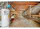 Utility basement showing the water heater and available storage opportunities at 1061 Pathfinder Rd, Marietta, GA 30066