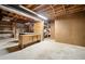 Spacious basement with exposed ceilings ideal for a workshop or hobby area at 1061 Pathfinder Rd, Marietta, GA 30066
