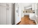 Spacious kitchen with white cabinets, refrigerator and hardwood floors at 1061 Pathfinder Rd, Marietta, GA 30066