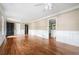 Spacious living room with hardwood floors, elegant trim, neutral paint and an open layout great for entertaining at 1061 Pathfinder Rd, Marietta, GA 30066
