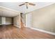 Open-concept living room boasts hardwood floors and crown molding detail at 1061 Pathfinder Rd, Marietta, GA 30066