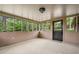 Comfortable sunroom with views of greenery; a seamless connection with nature at 1061 Pathfinder Rd, Marietta, GA 30066