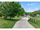 Scenic pathway leading to a playground and community center, surrounded by lush greenery at 1180 Brookhaven Park Ne Pl, Brookhaven, GA 30319