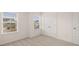Bedroom with natural light featuring a double door closet at 13250 Tolstoy Dr, Covington, GA 30014