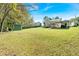 Expansive backyard, including a covered patio area and storage building at 198 Wiley Dr, Douglasville, GA 30134