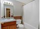 Clean bathroom with a vanity, toilet, and a shower-tub combination at 198 Wiley Dr, Douglasville, GA 30134