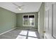 Serene bedroom with neutral walls, laminate floors, and natural light at 198 Wiley Dr, Douglasville, GA 30134