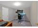 Contemporary bedroom with a workspace, multiple monitors, and a modern chair at 198 Wiley Dr, Douglasville, GA 30134