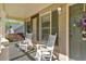 Relaxing front porch with comfortable seating, perfect for enjoying the outdoors at 198 Wiley Dr, Douglasville, GA 30134