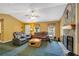 Comfortable living room features a stone fireplace, plush seating, and ample space at 198 Wiley Dr, Douglasville, GA 30134