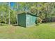 Green backyard storage shed at 198 Wiley Dr, Douglasville, GA 30134