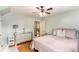Inviting bedroom with hardwood floors, a modern dresser, and a soft, cozy bed at 2044 Yucca Dr, Decatur, GA 30032