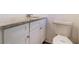 Bathroom with granite countertop vanity, and a white toilet at 2925 Heather Dr, Atlanta, GA 30344