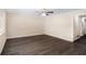 Spacious living room with hardwood floors, a ceiling fan, and neutral paint at 2925 Heather Dr, Atlanta, GA 30344