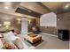 Cozy finished basement area with a white screen and comfortable seating, perfect for a home theatre at 334 Sutherland Ne Pl, Atlanta, GA 30307