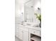 All white bathroom features double sink vanity with white countertops, lots of drawers and storage at 334 Sutherland Ne Pl, Atlanta, GA 30307