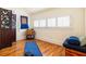 Bright bonus room with hardwood floors, window shutters, and space for yoga or exercise equipment at 334 Sutherland Ne Pl, Atlanta, GA 30307