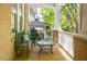 Relaxing front porch with brick flooring, bench, table, and pleasant outdoor seating at 334 Sutherland Ne Pl, Atlanta, GA 30307
