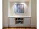 Hallway nook with cabinets and a decorative painting at 334 Sutherland Ne Pl, Atlanta, GA 30307