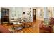 Inviting living room boasts hardwood floors, ample seating, and lots of natural light at 334 Sutherland Ne Pl, Atlanta, GA 30307