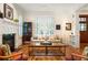Bright and airy living room with hardwood floors, fireplace, and stylish decor at 334 Sutherland Ne Pl, Atlanta, GA 30307