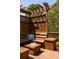 Charming outdoor seating area featuring a wooden bench and side tables, perfect for enjoying a quiet moment at 334 Sutherland Ne Pl, Atlanta, GA 30307
