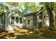 Backyard featuring trees and the exterior of the home at 1002 Forrest Blvd, Decatur, GA 30030