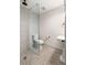 Bathroom featuring glass shower, toilet and sink at 1002 Forrest Blvd, Decatur, GA 30030