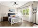Bedroom with ceiling fan and large windows providing lots of natural light at 1002 Forrest Blvd, Decatur, GA 30030