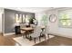 Elegant dining room with hardwood floors and stylish furnishings at 1002 Forrest Blvd, Decatur, GA 30030