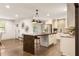 Spacious kitchen with a large wood-clad island and stainless steel appliances at 1002 Forrest Blvd, Decatur, GA 30030