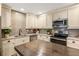 Well-lit kitchen featuring granite countertops and stainless steel appliances at 1002 Forrest Blvd, Decatur, GA 30030