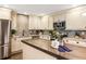 Bright kitchen with stone countertops, tiled backsplash, and stainless steel appliances at 1002 Forrest Blvd, Decatur, GA 30030