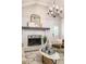 Living room features a brick fireplace, mantle, and lots of natural light at 1002 Forrest Blvd, Decatur, GA 30030