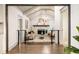 Inviting living room with vaulted ceilings, brick fireplace, and modern furnishings at 1002 Forrest Blvd, Decatur, GA 30030