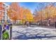 Gated entrance to the community with mature trees at 2482 Crescent Park Ct, Atlanta, GA 30339