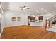 Open living space with hardwood floors, open layout, lots of natural light, and flow to the kitchen and stairway at 2482 Crescent Park Ct, Atlanta, GA 30339