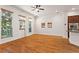 Bright and open living room with hardwood floors, large windows, and easy access to the outside with lots of natural light at 2482 Crescent Park Ct, Atlanta, GA 30339