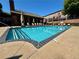 Sparkling pool with lounge seating and covered area at 2482 Crescent Park Ct, Atlanta, GA 30339