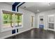Spacious bonus room features dark hardwood floors, backyard views and ensuite bathroom at 3024 Eamont Ter, Atlanta, GA 30328
