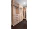 Spacious walk-in closet with built-in shelving and drawers providing ample storage space at 3024 Eamont Ter, Atlanta, GA 30328