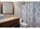 Bathroom features granite countertops, decorative shower curtain, and a new vanity at 3127 Lenox Ne Rd # 20, Atlanta, GA 30324
