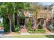 Charming brick home with mature trees, manicured landscaping, and a welcoming entrance at 3127 Lenox Ne Rd # 20, Atlanta, GA 30324
