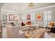 Living room boasting shiplap walls, modern decor, hardwood floors, and lots of natural light at 3127 Lenox Ne Rd # 20, Atlanta, GA 30324
