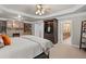 Main bedroom with a fireplace, built-in bookcases, media center and an ensuite bathroom at 3127 Lenox Ne Rd # 20, Atlanta, GA 30324
